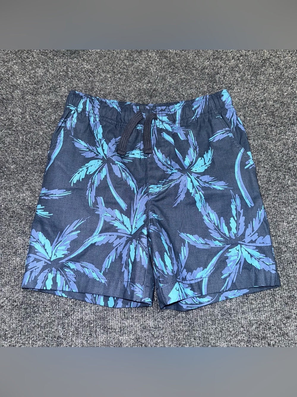 Tommy Bahama blue and purple palm tree print swim shorts with pockets